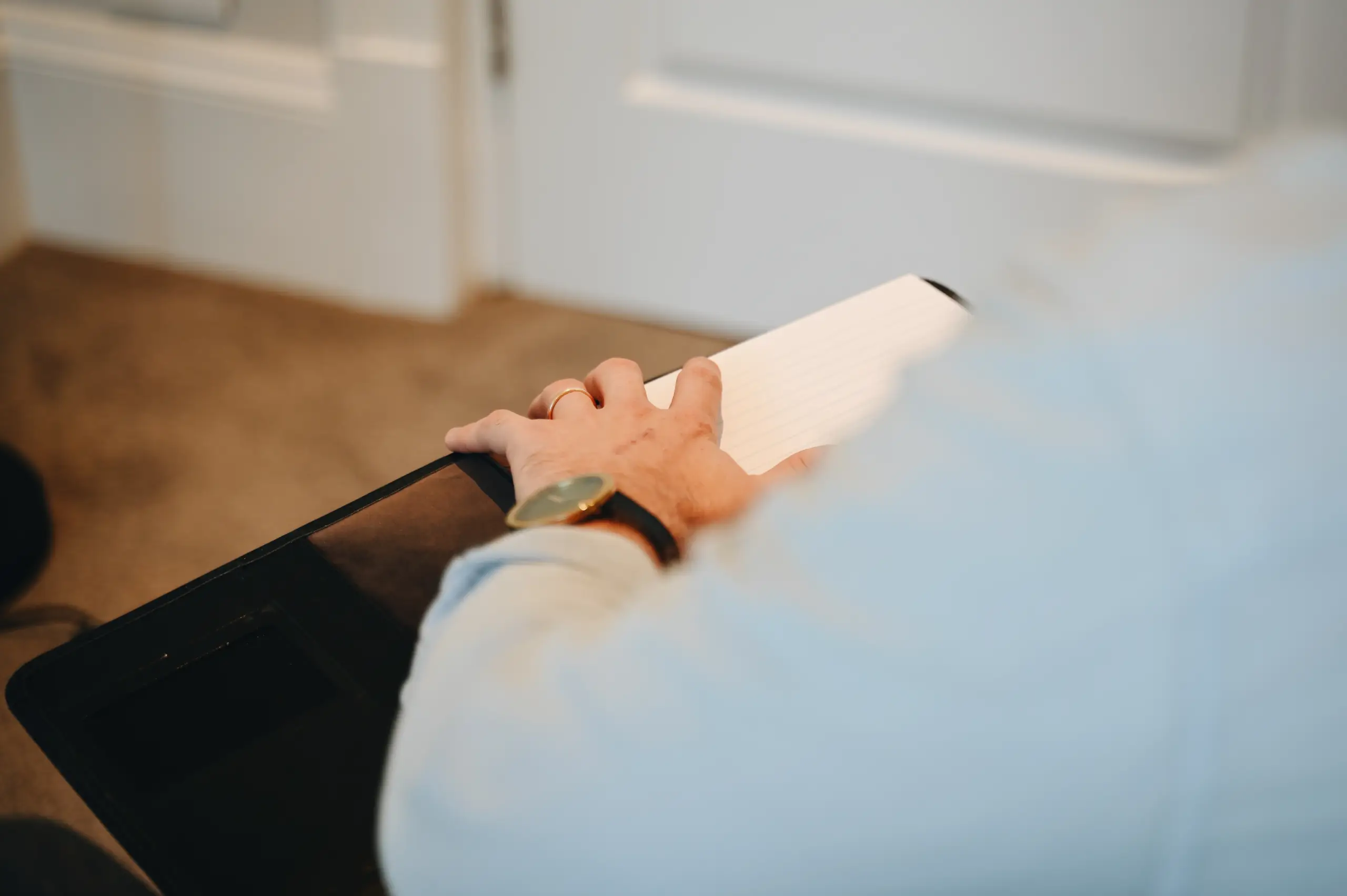 Modern minimalist therapy office with warm wood accents